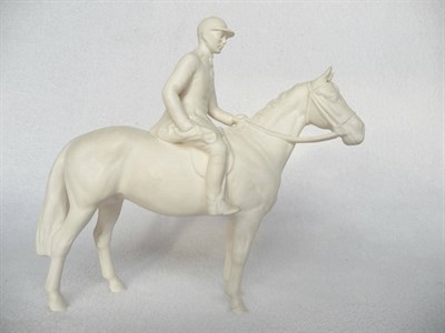 Lot 1087 - Beswick Huntsman in white matt on standing horse, model No. 1501, 21cm high