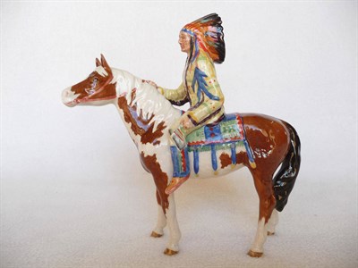 Lot 1092 - Beswick Indian Mounted on Skewbald Pinto Pony, model No. 1391, gloss, 21.6cm high (restorations)