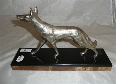 Lot 8 - Michel Decoux: An Art Deco silvered metal Alsatian, modelled in a striding pose, on a...