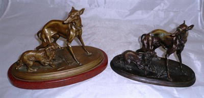 Lot 21 - A bronzed figure of a Greyhound with a spaniel and a similar brass model with ceramic base (2)