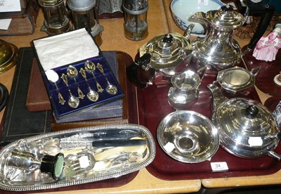 Lot 34 - Silver trophy cup, various cased and loose flatware and plated items (on two trays)