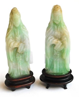 Lot 103 - A Pair of Chinese Jade Type Figures of Maidens, in flowing robes, 10cm high, with wooden stands