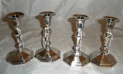 Lot 49 - A Set of Four Victorian and later matched candlesticks, all Hawkesworth, Eyre & Co Ltd,...