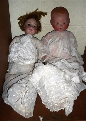 Lot 75 - Armand Marseille 390 doll in cotton dress and bonnet and an Armand Marseille baby doll in white...