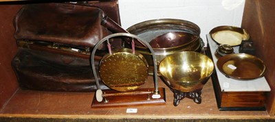 Lot 76 - A set of walnut weighing scales with marble plateau and brass weights, a brass dinner gong, a brass