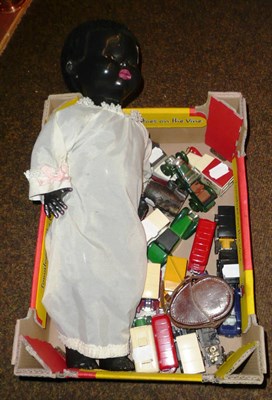 Lot 78 - Mulatto doll, sixteen toy cars, leather cased compass, soapstone vessel