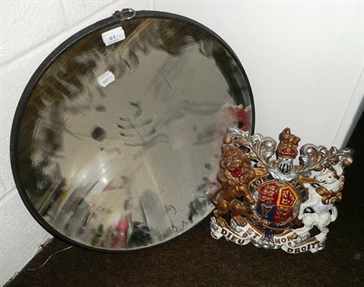 Lot 91 - A large concave circular mirror by Clarke Chapman & Co Ltd, dated 19/6/44; a painted cast iron coat