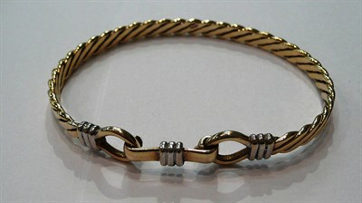 Lot 97 - A 9ct gold bangle