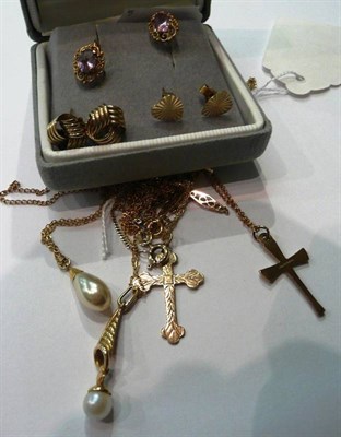 Lot 98 - Three cross pendants and two cultured pearl pendants on chains and two pairs of earrings