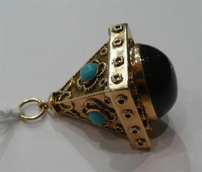 Lot 100 - A gold coloured turquoise set pendant/fob