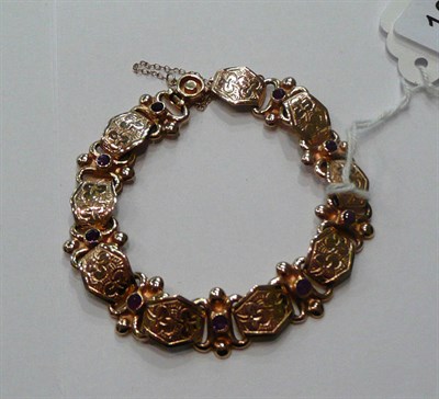 Lot 106 - A rose gold and amethyst bracelet