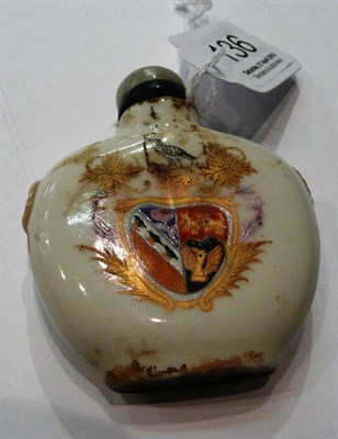 Lot 136 - A Chinese armorial porcelain snuff bottle, Qing dynasty, of flattened rounded form, relief...