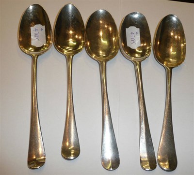 Lot 147 - A composite set of five 18th Century silver Old English pattern table spoons, various London...