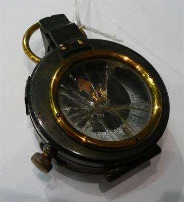 Lot 152 - A military compass with brown leather case