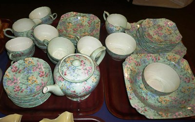 Lot 156 - Shelley 'Melody' pattern tea service, ten teacups, twelve saucers, two sugar bowls, two milk...