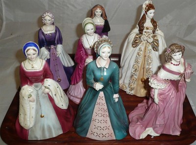 Lot 161 - Seven Coalport china figures; Anne Boleyn, Catherine of Aragon, Katherine Howard, Jane Seymour,...