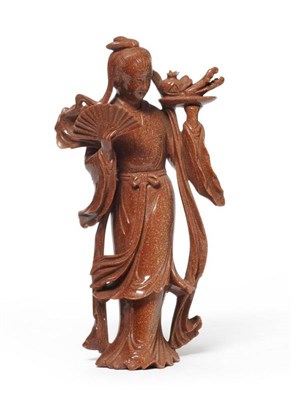 Lot 117 - A Chinese Aventurine Figure of a Maiden, standing in flowing robes holding a tray of fruit, a...