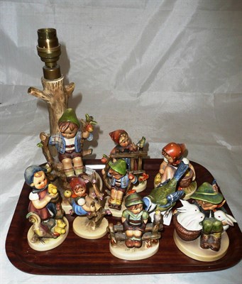 Lot 198 - Eight Goebel figures and a Goebel lamp base