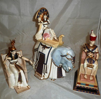 Lot 202 - Three Royal Worcester china figures; Cleopatra, The Lion of Rameses and The Jewels of Cleopatra