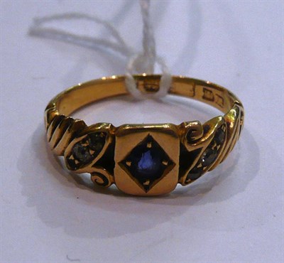 Lot 266 - An 18ct gold sapphire and diamond ring