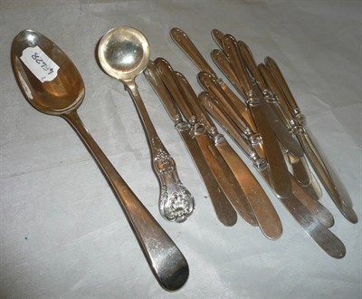 Lot 273 - A Hester Bateman tablespoon, twelve silver handled tea knives and a plate sauce ladle