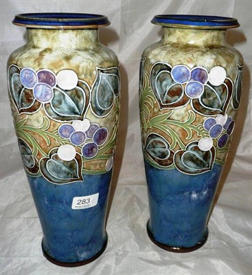 Lot 283 - A pair of Doulton stoneware Art Nouveau vases by Florrie Jones