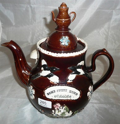 Lot 285 - A Measham bargeware teapot