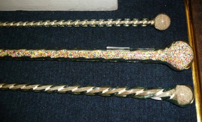 Lot 308 - Three glass canes