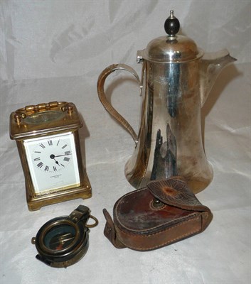 Lot 311 - A Hukin and Heath hot water jug, No. 18747, a brass carriage clock and a World War I pocket compass