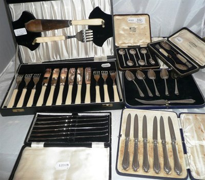 Lot 332 - Six silver seal topped coffee spoons, five grapefruit spoons and knife, set of six tea knives,...