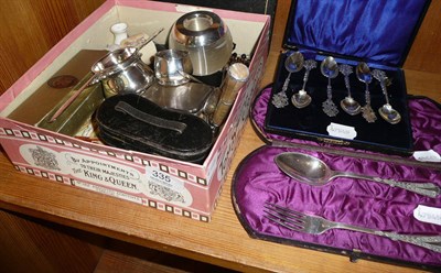 Lot 335 - A quantity of silver and collectors items including match striker, silver spoon enamelled with...