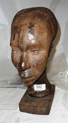 Lot 342 - A Benin, Nigeria carved hardwood head and shoulders study on a square plinth