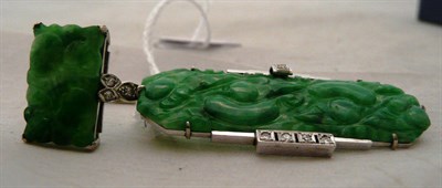 Lot 350 - A carved jade and diamond set bar brooch, and a ring (2)