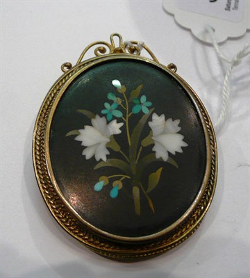 Lot 357 - A Pietra Dura brooch in a 15ct gold setting