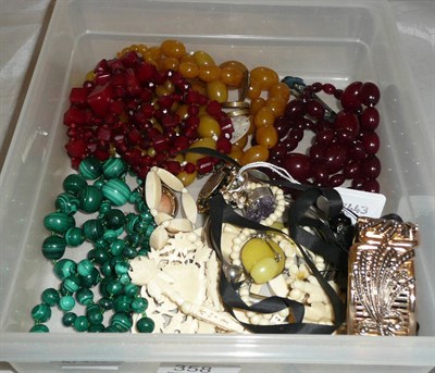 Lot 358 - Assorted bead necklaces including malachite, bone, amber and amber type, a mourning brooch,...