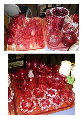 Lot 379 - A quantity of cranberry glass including beakers, glasses, decanter, vases, jars and covers etc...