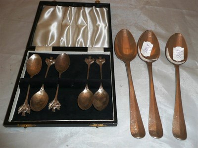 Lot 415 - A set of three Dutch silver Old English pattern tablespoons; a cased set of five silver thistle end