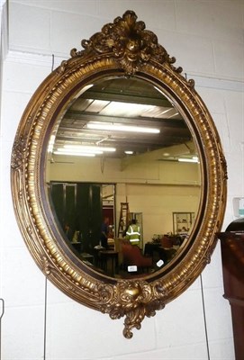 Lot 483 - Large oval gilt mirror