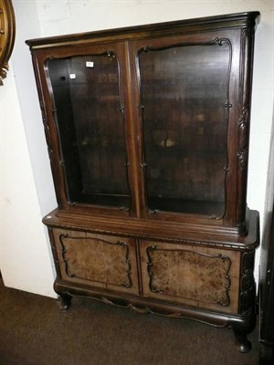 Lot 490 - A walnut display cabinet