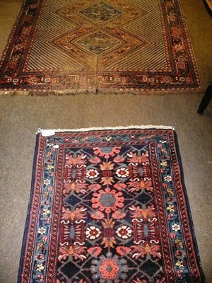 Lot 500 - An Afshar Rug South East Persia  The chequered field with three diamond medallions 195 x 152 cm...