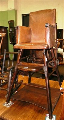 Lot 523 - A child's leather upholstered metamorphic high chair