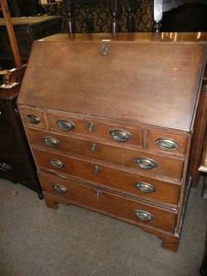 Lot 527 - Early 19th century oak bureau