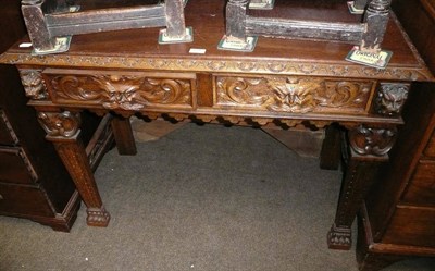 Lot 533 - A Victorian carved oak hall table