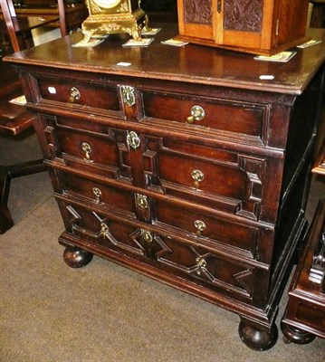 Lot 544 - 17th century oak four height chest