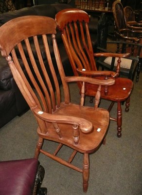 Lot 550 - Two elm and beech lath back Windsor chairs