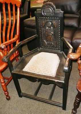 Lot 551 - Late 19th/early 20th century carved oak open armchair