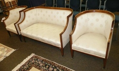 Lot 560 - A three piece Edwardian suite comprising of two chairs and a two seater settee