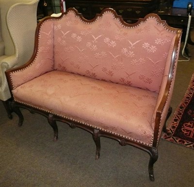 Lot 569 - A rosewood framed hump back settee