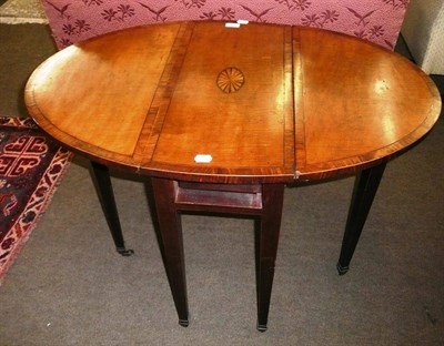 Lot 574 - A 19th century satinwood and mahogany Pembroke table