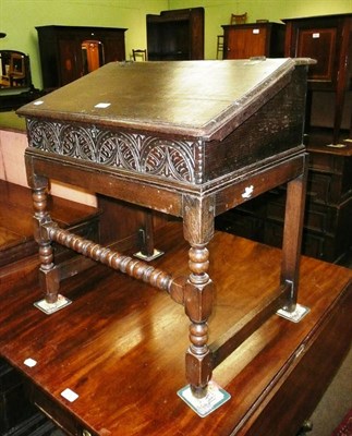 Lot 575 - An oak bible box on stand